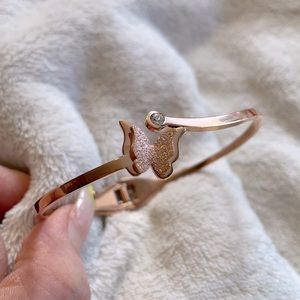 EUC Rose gold butterfly bangle